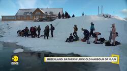 Greenland: Bathers flock old harbour of Nuuk News Clip