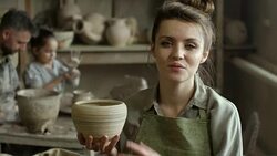 Happy Woman Posing in Pottery Workshop Stock Footage