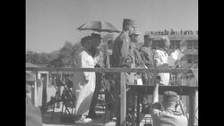 South Korean President Syngman Rhee decorates General James Van Fleet with medal at outdoor ceremony in Seoul in 1952 News Clip