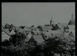 Adolf Hitler on a train, possibly arriving at the 1935 Nuremberg Rally Stock Footage