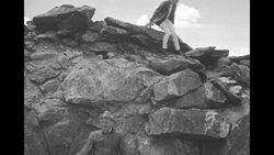 Man and woman on glacier News Clip