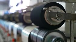 White yarn spools of industrial warping machine in textile factory Stock Footage