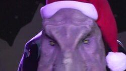 CLEAN : Ho ho roar: London's giant T.rex gets into the Xmas spirit with woolly jumper News Clip