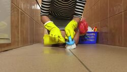 Woman clean bathroom floor Stock Footage