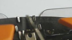 Close up footage of a person writing JUSTICE on an old typewriter, with sound Stock Footage