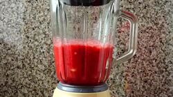Preparation in the blender of apples, raspberry and bananas.	Preparation of smoothie in the blender. Stock Footage