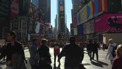CLEAN : Unmasked: costume capers stir New York's Times Square News Clip