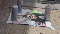 CLEAN : Argentina street artist paints mural of Messi raising World Cup trophy News Clip