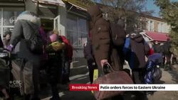 Putin stokes tensions with Ukraine, orders peacekeepers into separatist regions News Clip