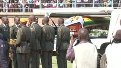 CLEAN : Mugabe's body arrives at Rufaro stadium for public ceremony News Clip