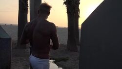 Sexy Muscular Man Showering at the Beach Stock Footage