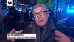 Rockefeller Center in NYC lights Christmas tree Instructional Video