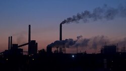 Metallurgical plant against the background of the pre-dawn sky Stock Footage