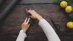 Swedish woman wrapping Christmas presents Stock Footage
