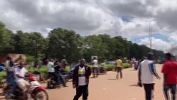 CLEAN : Burkina Faso military and protesters head towards national television station News Clip