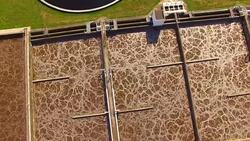Aerial view to sewage treatment plant. Grey water recycling. Waste management theme. Stock Footage