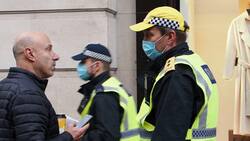 Protester led away in handcuffs by police at anti-lockdown demo in London News Clip