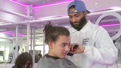 UK: People having hair cut inside barbershop after Coronavirus lockdown restrictions are lifted. News Clip