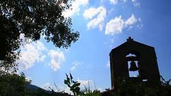 Timelapse of french tower bell with shining sun in Pyrenees, France Stock Footage