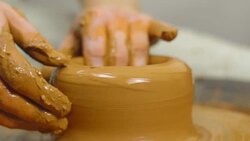 Potter makes a jug Stock Footage