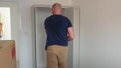 Mature Man Building a Wardrobe Stock Footage