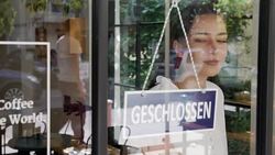 Young woman running a German small business Stock Footage