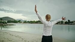 Businesswoman enjoying the beach Stock Footage