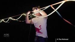 #TheMoment a slackliner set a daring world record News Clip