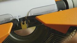 Footage of a person writing TERRORISM HAS NO RELIGION on an old typewriter Stock Footage