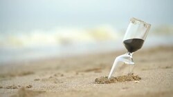 4k Sand clock on the beach, business concept teamwork & time management Stock Footage