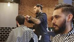Hairdressers giving new look to customers at salon Stock Footage