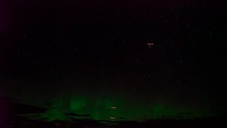 Realistic real time (not timelapse) aurora borealis (northern lights), a falling star and an artificial satellite Stock Footage