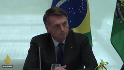 Bolsonaro attends rally as Brazil political scandal heats up News Clip