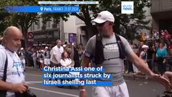 Wounded photojournalist carries Olympic flame in Paris Instructional Video