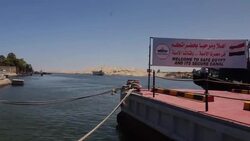 Boat in canal with "Welcome to Safe Egypt & Its secure canal" sign News Clip