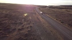 Aerial Drone Footage of Semi-Trucks Rolling Down the Highway Stock Footage