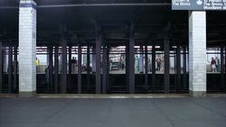 MEDIUM ANGLE OF SUBWAY OR TRAIN PLATFORM. SEE PASSENGERS STANDING ON OTHER SIDE OF PLATFORM. Stock Footage