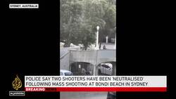 Video shows bystander tackling and disarming one of the shooters at Sydney’s Bondi Beach News Clip