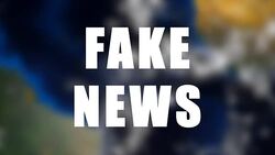 Letters of Fake news text on background with rotating earth Stock Footage