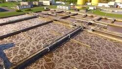 Aerial view to sewage treatment plant. Grey water recycling. Waste management theme. Stock Footage