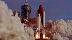 Wide shot space shuttle Discovery taking off with enormous amount of smoke / Florida Stock Footage