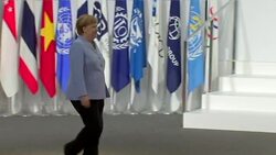 Shinzo Abe greeting German Chancellor Angela Merkel at the G20 Summit News Clip