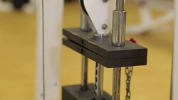 Close-up plates stacked of weight machine with kilogram and pound at fitness gym Stock Footage