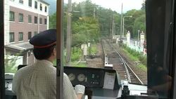Hakone Tozan Mountain Train Passing Trough Small Stations, Tunnels And Winding Through A Narrow, Densely Wooded Valley In Hakone, Japan Stock Footage