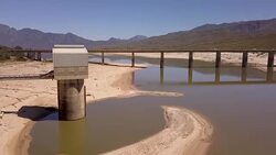 Aerial of empty dam Stock Footage