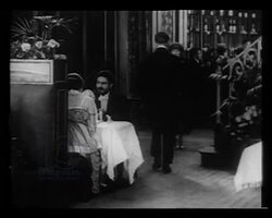 Deinterlaced EDIT IMW 931098 High society in Paris, early 20s fun in cars, diners in Maxim's, gossip at a wedding Stock Footage