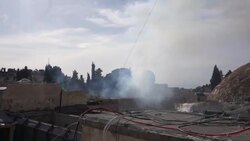 CLEAN : Teargas billowing at Jerusalem's Al-Aqsa mosque compound amid fresh clashes News Clip