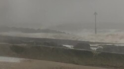 Stormy sea crashing onto shore News Clip
