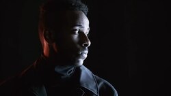 Portrait Shot of Black Man in Dark Studio Stock Footage