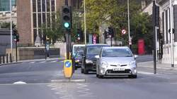 Traffic busy on London's Tower Bridge News Clip